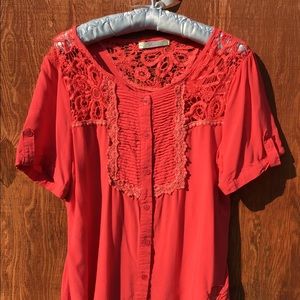 Adorable peasant style button down blouse.